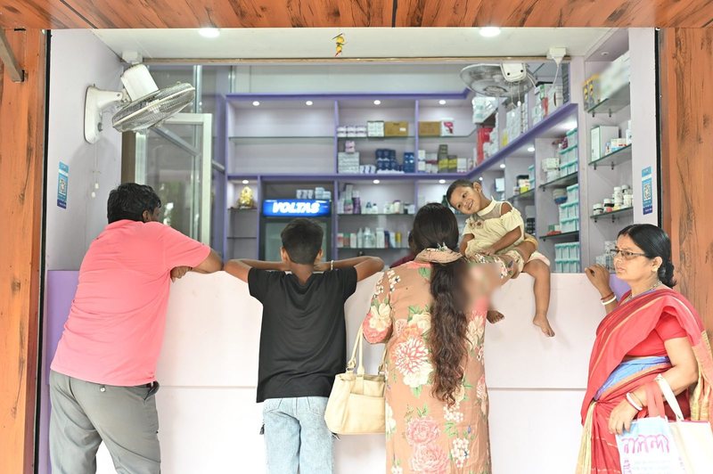 Patients at the pharmacy counter of Uttarbanga Clinic, Cooch Behar, in an earlier year