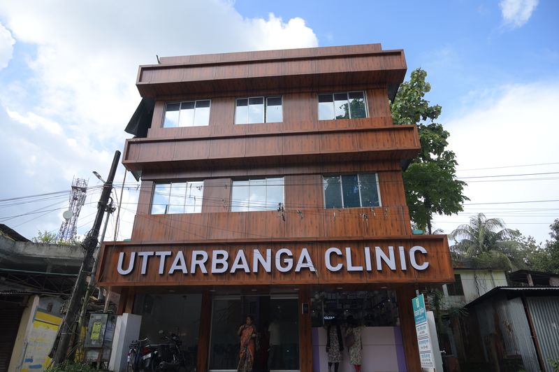 Uttarbanga Clinic building on Sunity Road, Cooch Behar, with the clinic name across the front