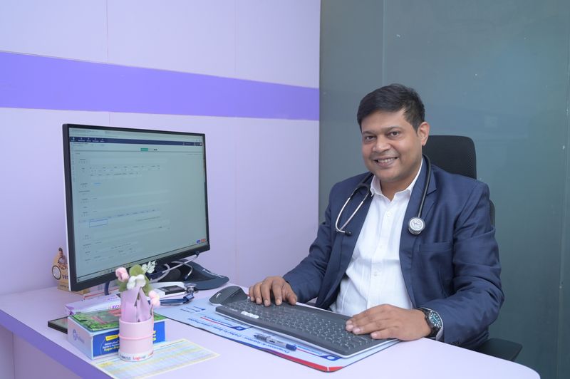 Dr Soumya Ghosh in the consulting room at Uttarbanga Clinic, Cooch Behar, where chest pain is assessed with ECG