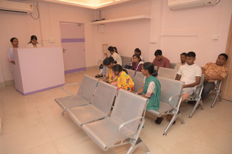 Reception desk and air-conditioned waiting area at Uttarbanga Clinic, Cooch Behar